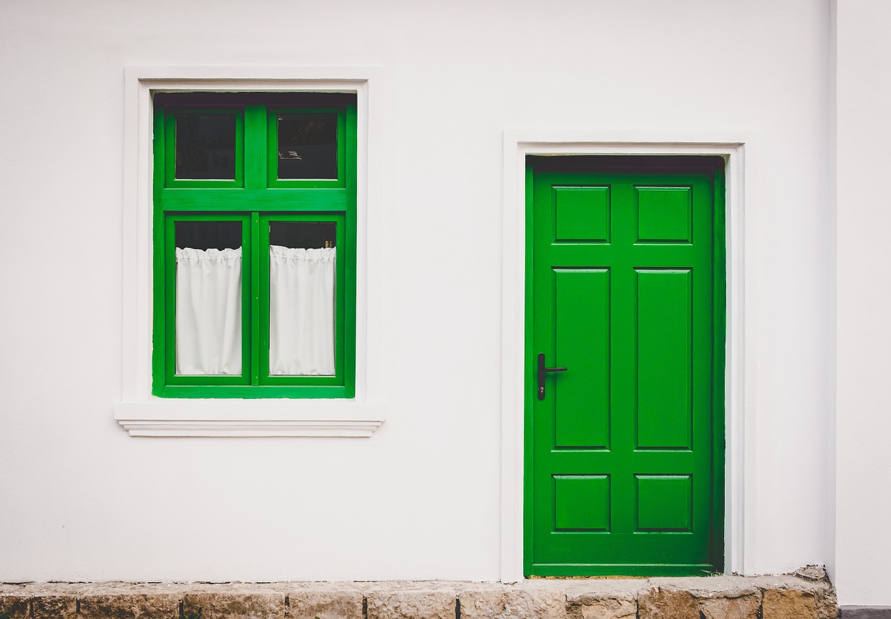 house front green door and window
