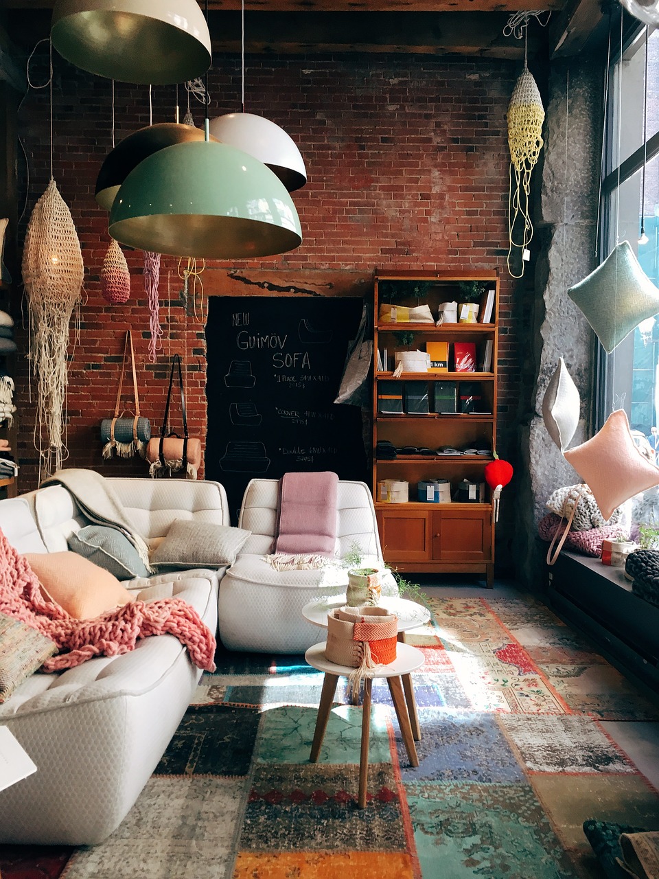 living room with brick wall